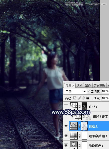 PS调色调出唯美蓝色逆光效果的树下美女照片