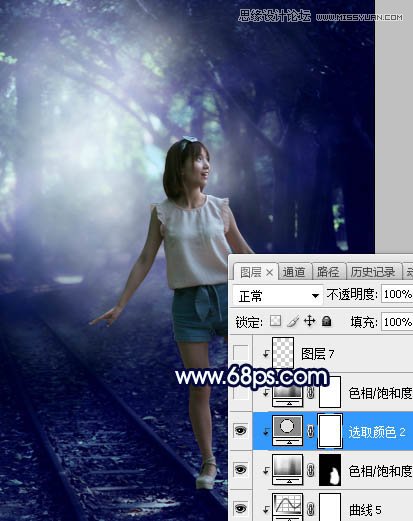 PS调色调出唯美蓝色逆光效果的树下美女照片