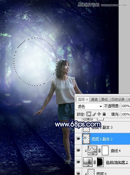 PS调色调出唯美蓝色逆光效果的树下美女照片