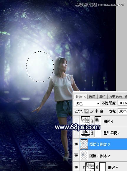 PS调色调出唯美蓝色逆光效果的树下美女照片